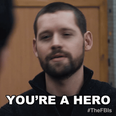 A Man With A Beard Is Being Called A Hero GIF
