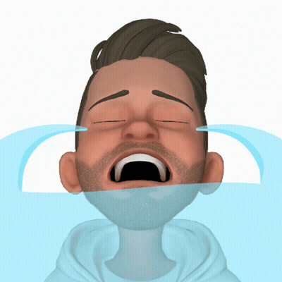 A Man With A Beard Is Crying With His Eyes Closed GIF