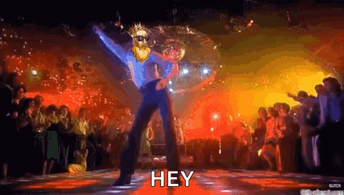 A Man With A Beard Is Dancing In Front Of A Disco Ball In A Nightclub . GIF