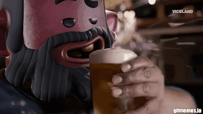 A Man With A Beard Is Drinking A Beer From A Glass With Viceland Written In The Corner GIF