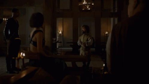 A Man With A Beard Is Drinking From A Glass And Says I Drink And I Know Things GIF