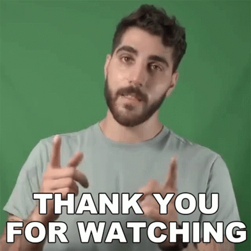 A Man With A Beard Is Giving A Thank You For Watching Sign . GIF