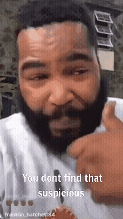 A Man With A Beard Is Giving A Thumbs Up And Saying You Dont Find That Suspicious . GIF