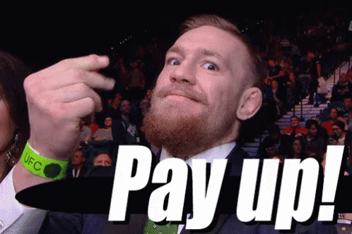 A Man With A Beard Is Giving A Thumbs Up And The Words Pay Up Are Behind Him GIF