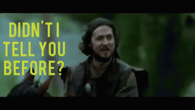 A Man With A Beard Is Holding A Gun And Says " Didn 'T I Tell You Before " GIF