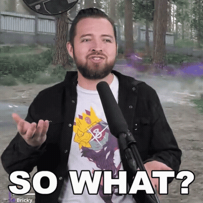 A Man With A Beard Is Holding A Microphone And Saying So What GIF