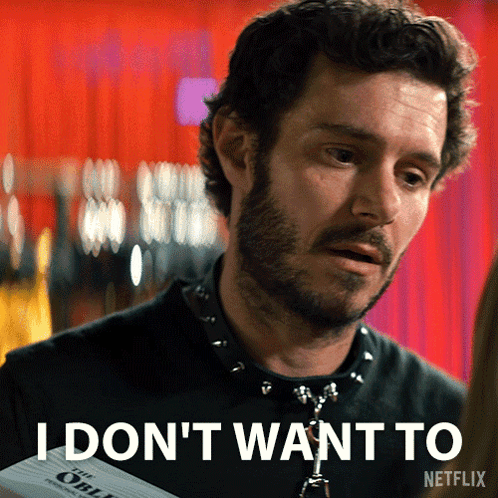 A Man With A Beard Is Holding A Piece Of Paper That Says I Don 'T Want To GIF