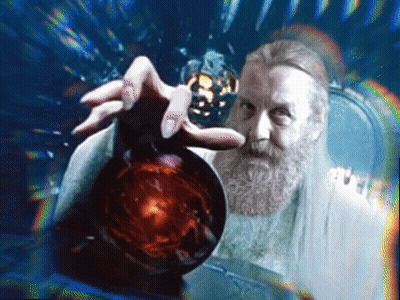 A Man With A Beard Is Holding A Red Sphere In His Hand GIF