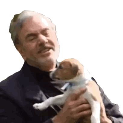 A Man With A Beard Is Holding A Small Brown And White Puppy In His Arms . Sticker