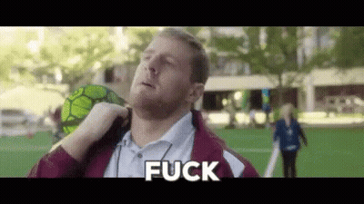 A Man With A Beard Is Holding A Soccer Ball Over His Shoulder And Saying Fuck . GIF