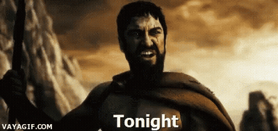 A Man With A Beard Is Holding A Spear And The Word Tonight Is Above Him GIF