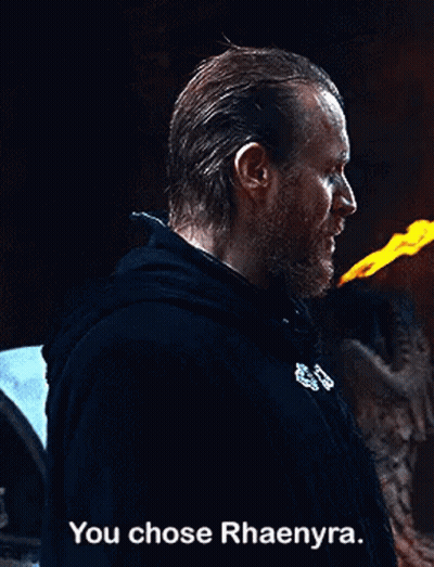 A Man With A Beard Is Holding A Torch In His Hand And Says `` You Chose Rhaenyra . '' GIF