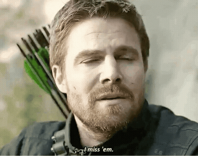 A Man With A Beard Is Holding An Arrow And Saying I Miss Em GIF