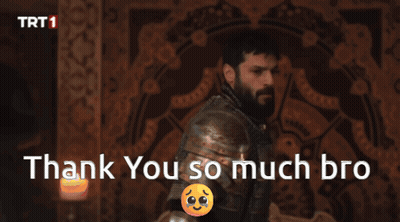 A Man With A Beard Is Hugging Another Man With The Words Thank You So Much Bro Below Him GIF