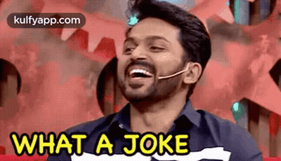 A Man With A Beard Is Laughing And Saying `` What A Joke '' . GIF