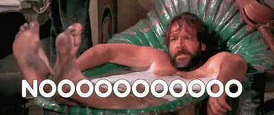 A Man With A Beard Is Laying In A Bathtub With The Words Nooo On The Bottom Right GIF