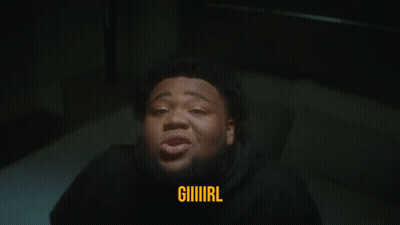 A Man With A Beard Is Laying On A Bed And The Word Giiiiirl Is Above Him GIF