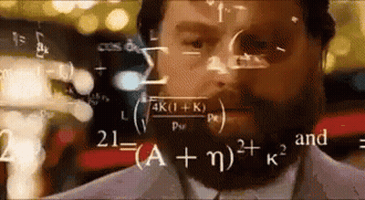 A Man With A Beard Is Looking At Mathematical Equations On A Screen . GIF
