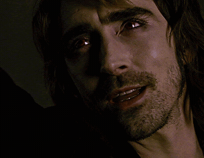 A Man With A Beard Is Looking At The Camera With His Mouth Open GIF