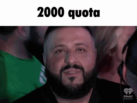 A Man With A Beard Is Looking At The Camera With The Words 2000 Quota Written Above Him . GIF