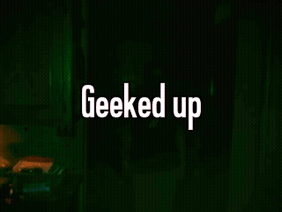 A Man With A Beard Is Looking At The Camera With The Words Geeked Up Above Him GIF