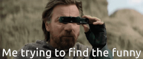 A Man With A Beard Is Looking Through Binoculars With The Words " Me Trying To Find The Funny " Below Him GIF