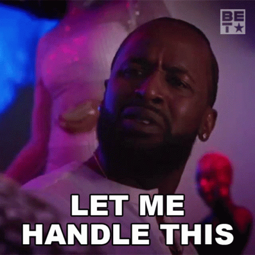 A Man With A Beard Is Making A Face And Says Let Me Handle This . GIF