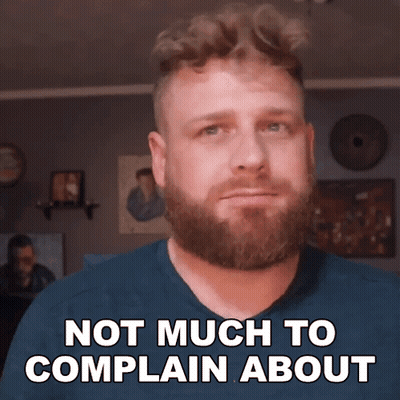 A Man With A Beard Is Making A Face And Says Not Much To Complain About GIF