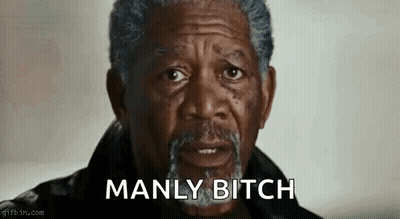 A Man With A Beard Is Making A Funny Face And Saying Manly Bitch . GIF