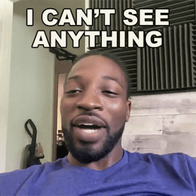 A Man With A Beard Is Making A Funny Face And Says I Can T See Anything GIF