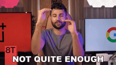 A Man With A Beard Is Making A Funny Face And Says Not Quite Enough GIF