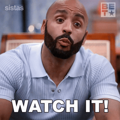 A Man With A Beard Is Making A Funny Face And Says Watch It GIF