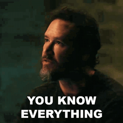 A Man With A Beard Is Making A Funny Face And Says You Know Everything . GIF