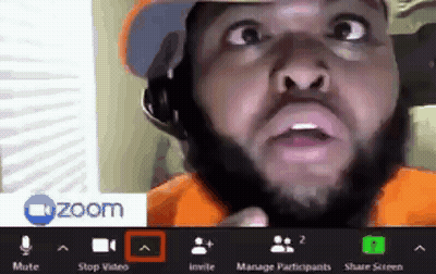 a man with a beard is making a funny face during a zoom call .