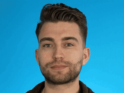 A Man With A Beard Is Making A Funny Face GIF