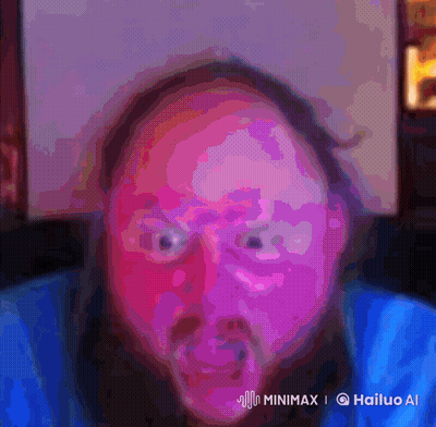 A Man With A Beard Is Making A Funny Face In A Colorful Painting GIF
