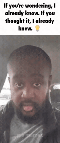 A Man With A Beard Is Making A Funny Face With A Light Bulb Behind Him GIF