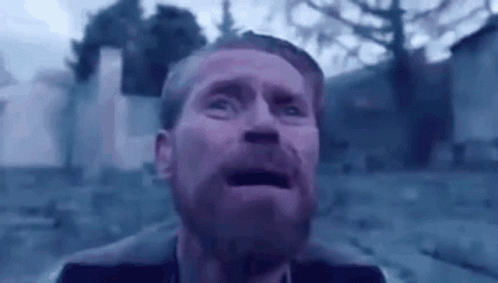 A Man With A Beard Is Making A Funny Face With His Mouth Open In A Video Game . GIF