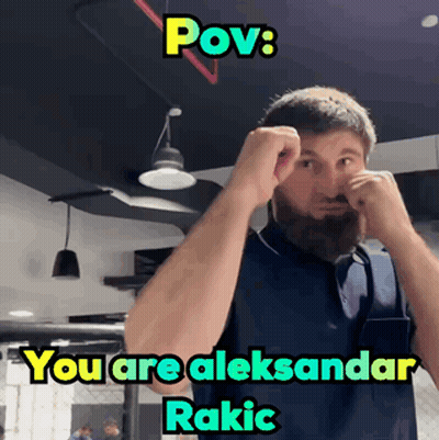 A Man With A Beard Is Making A Funny Face With The Caption " Pov : You Are Aleksandar Rakic " GIF