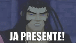 A Man With A Beard Is Making A Funny Face With The Words Ja Presente Written Below Him GIF