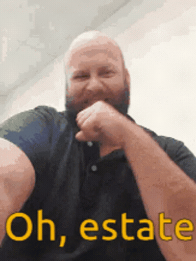 A Man With A Beard Is Making A Funny Face With The Words Oh Estate GIF