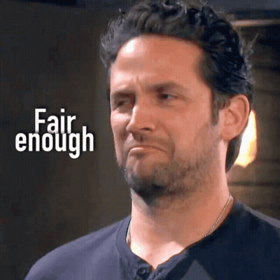A Man With A Beard Is Making A Sad Face With The Words Fair Enough Behind Him GIF