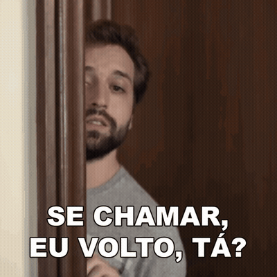 A Man With A Beard Is Peeking Through A Door And Says Se Chamar Eu Volto Ta ? GIF