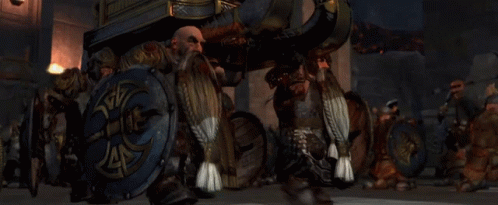 A Man With A Beard Is Reading A Book GIF