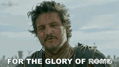 A Man With A Beard Is Saying `` For The Glory Of Taxman '' While Standing In Front Of A City . GIF