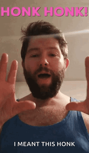 A Man With A Beard Is Saying Honk Honk GIF