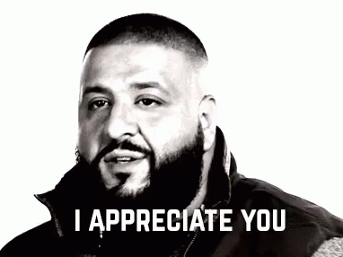 A Man With A Beard Is Saying `` I Appreciate You '' In A Black And White Photo . GIF