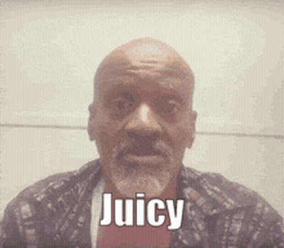 A Man With A Beard Is Saying Juicy In Front Of His Face GIF