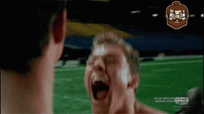 A Man With A Beard Is Screaming In Front Of Another Man GIF