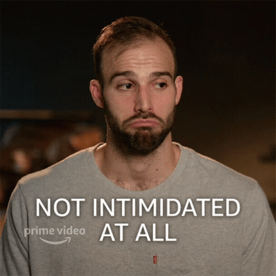 A Man With A Beard Is Shown With The Words Not Intimidated At All On The Bottom GIF